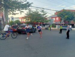 Minggu Pagi, Polres Gowa Turunkan Personilnya Amankan Rute yang Dilalui Peserta Fun Run Walk